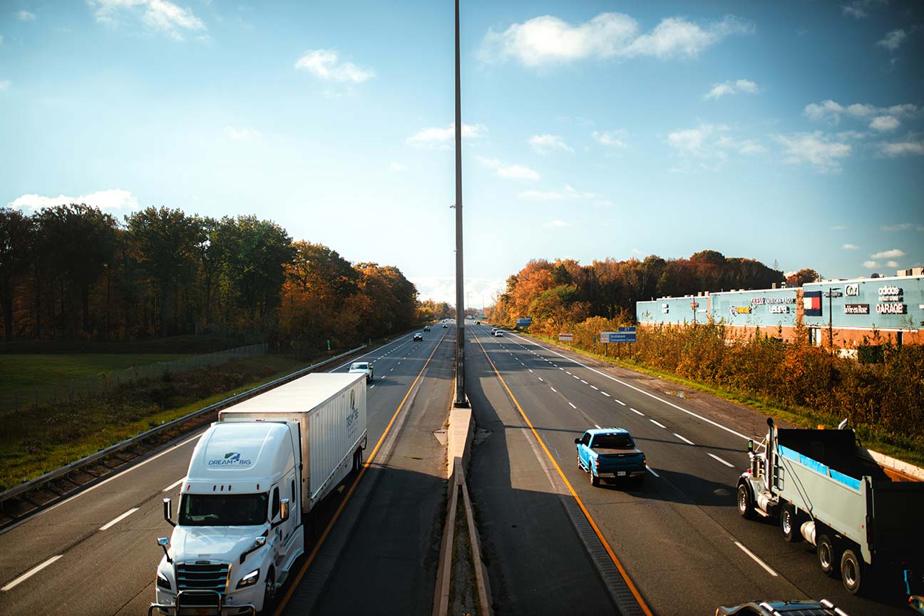 Freight truck on autumn highway